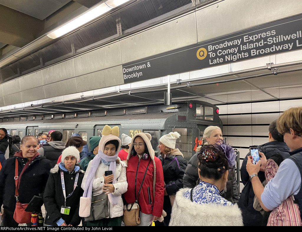 More fancy outfits on people at 96th St Sta with the Holiday Train in the background 